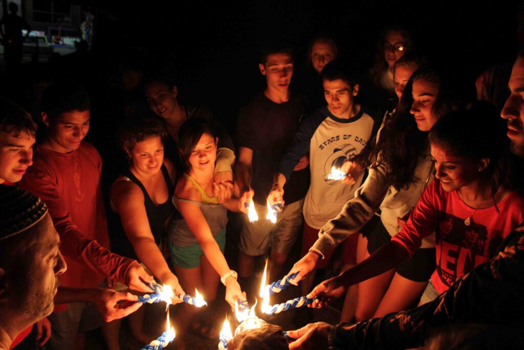 Teens celebrating havdalah at Camp Solomon Schecter