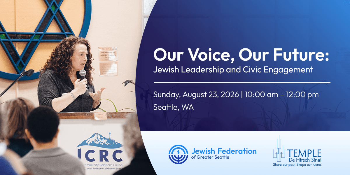 Woman speaker at a podium addressing an audience, with event title banner on the right reading 'Our Voice, Our Future: Jewish Leadership and Civic Engagement' and logos below.
