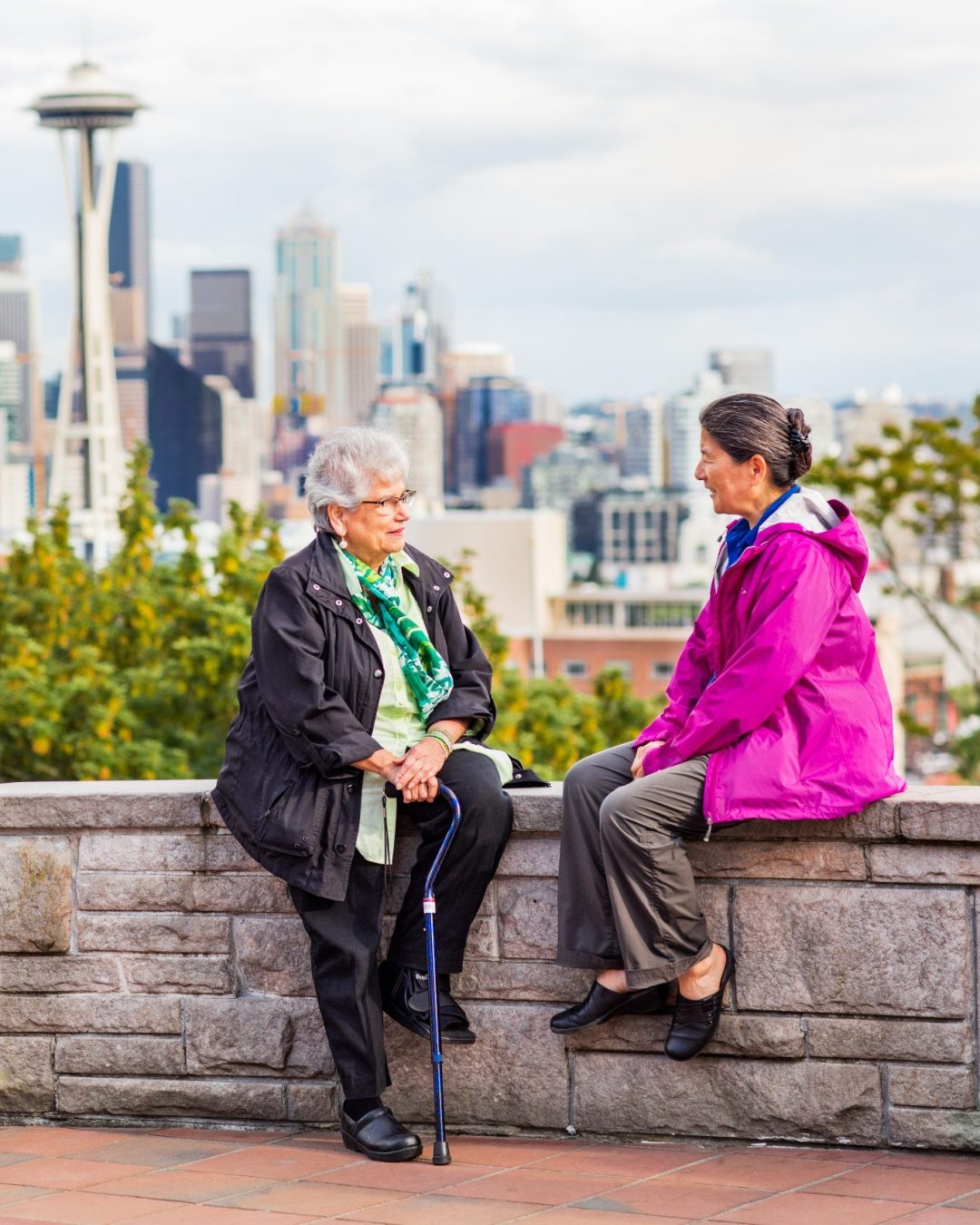 Two Senior Woman Talking High Above Seattle
