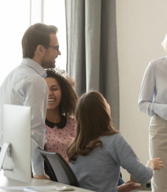 Laughing,Old,Coach,Team,Leader,Talking,With,Diverse,Coworkers,Chatting